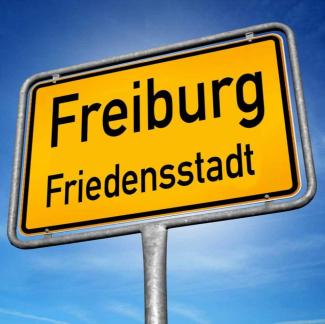 Ortsschild Friedensstadt Freiburg